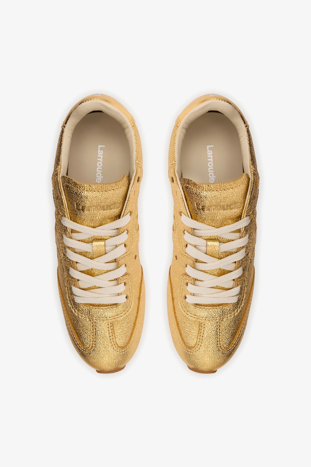Stella Sneaker In Gold Metallic Leather - Larroude