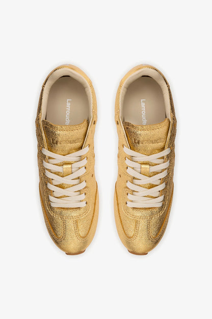 Stella Sneaker In Gold Metallic Leather - Larroude