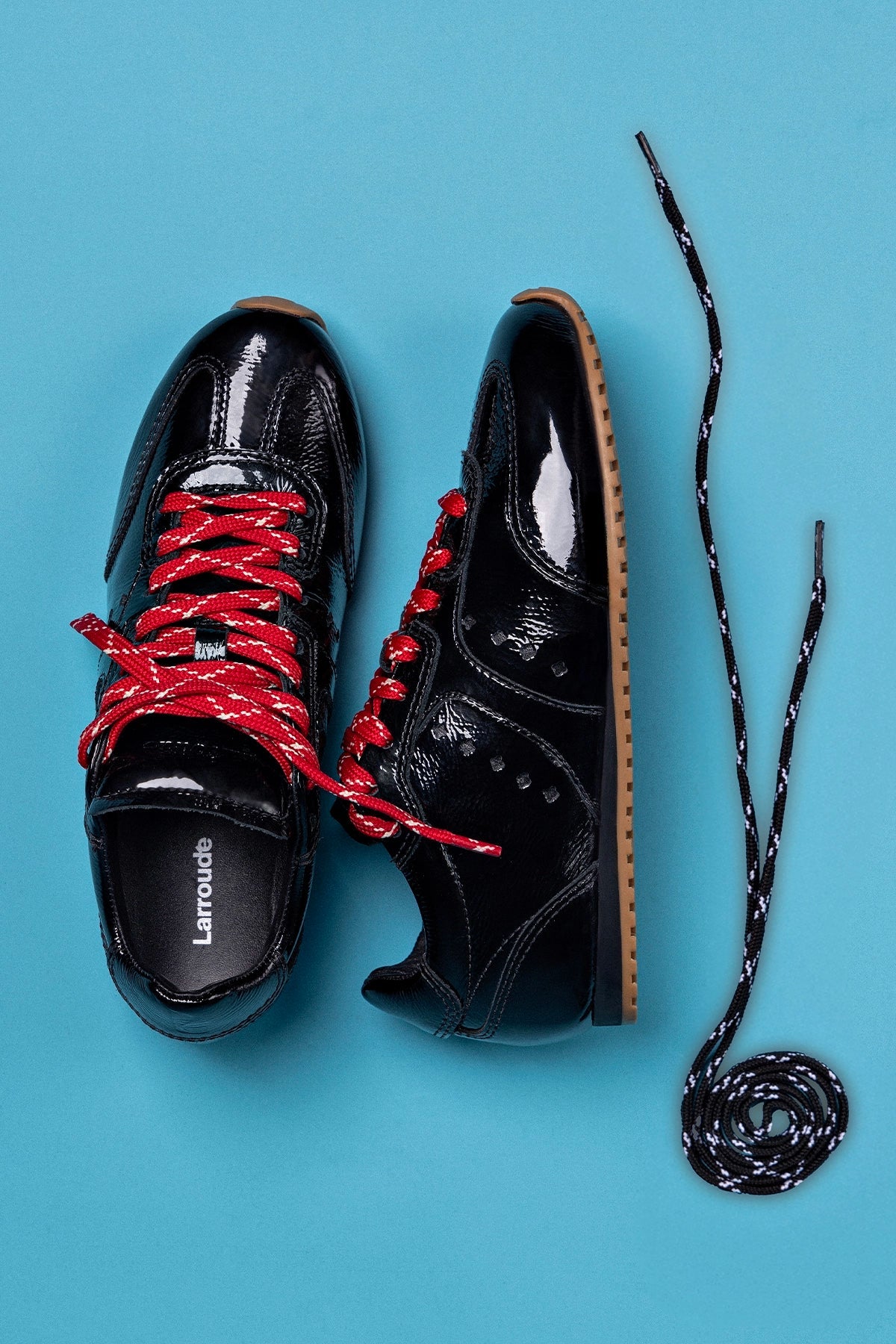 Stella Sneaker In Black Patent Leather - Larroude