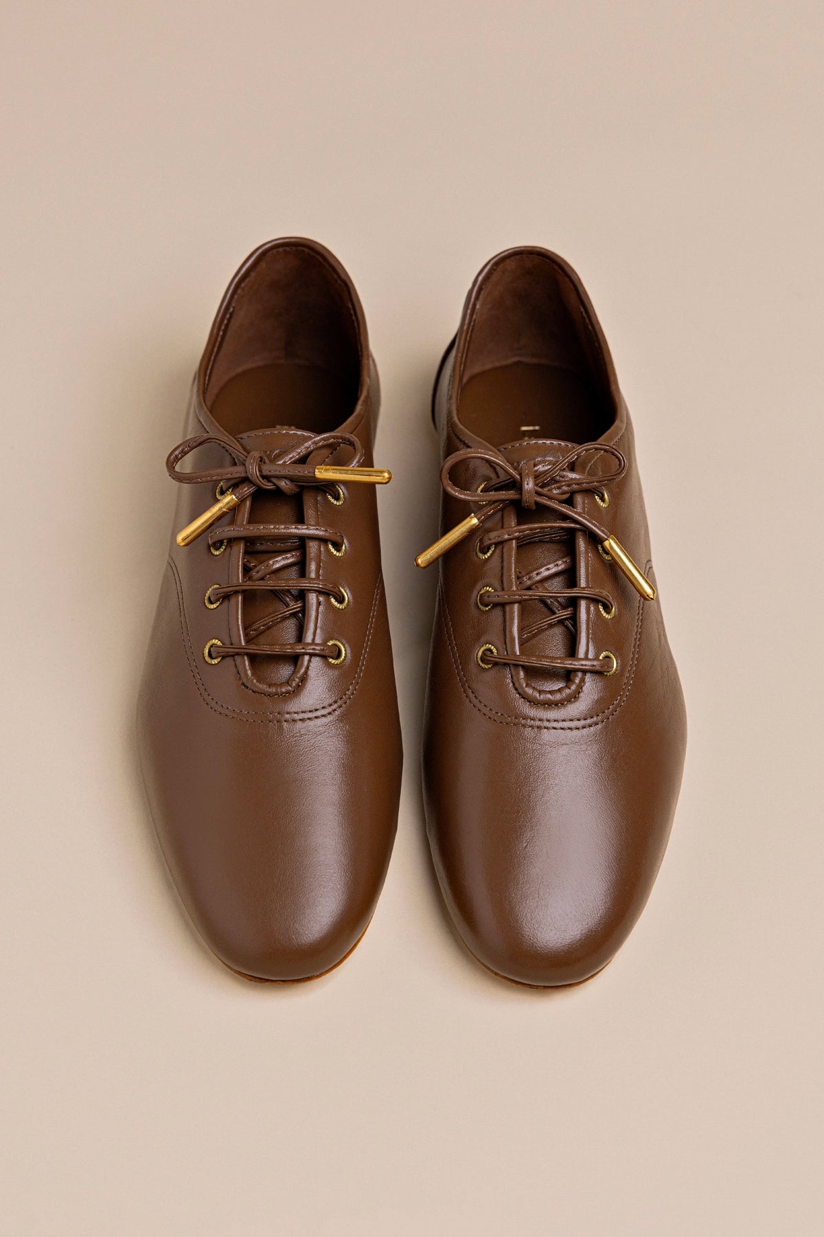 Liza Sneaker In Burnt Umber Leather - Larroude